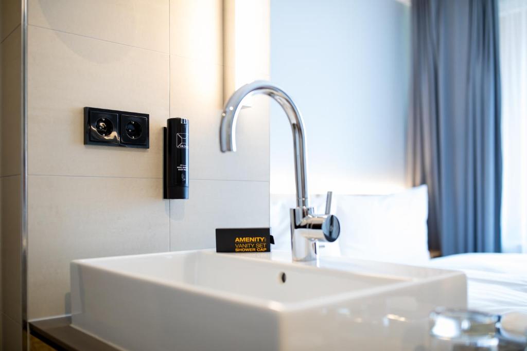 Koupelna v ubytování mk | hotel münchen city