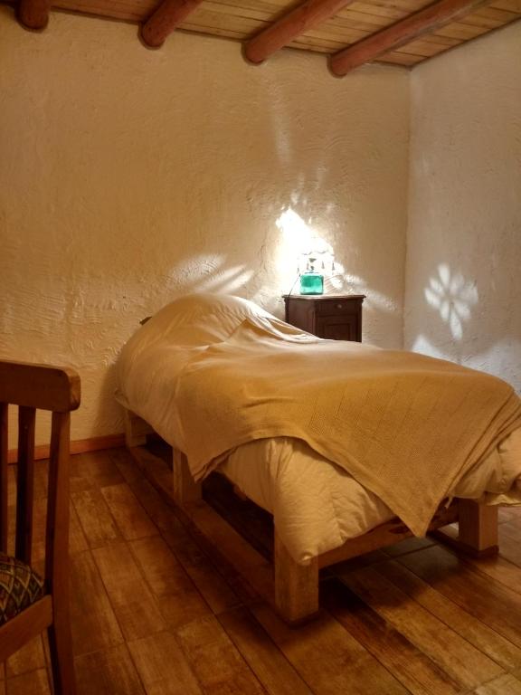 Postel nebo postele na pokoji v ubytování Posada la Piedra