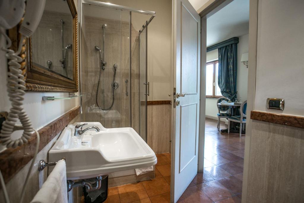 Koupelna v ubytování Hotel Quadrifoglio Roma Eur