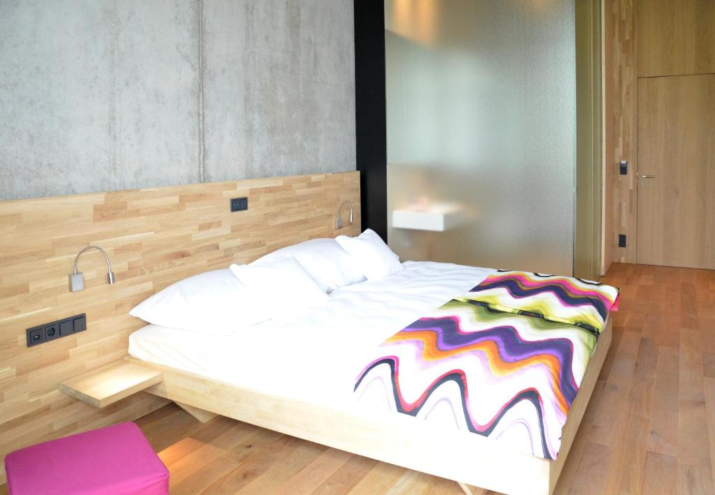 Voodi või voodid majutusasutuse Hotel de l'Ecluse Superior toas