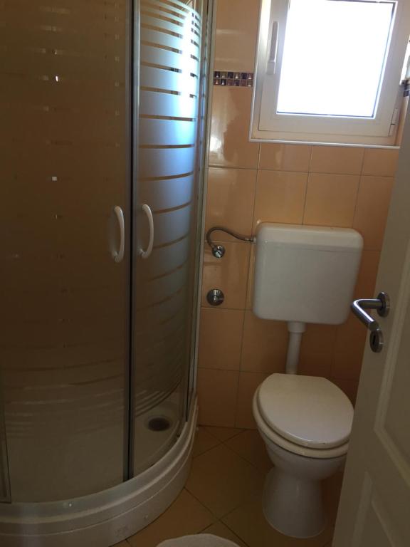 Kúpeľňa v ubytovaní Apartments Duda