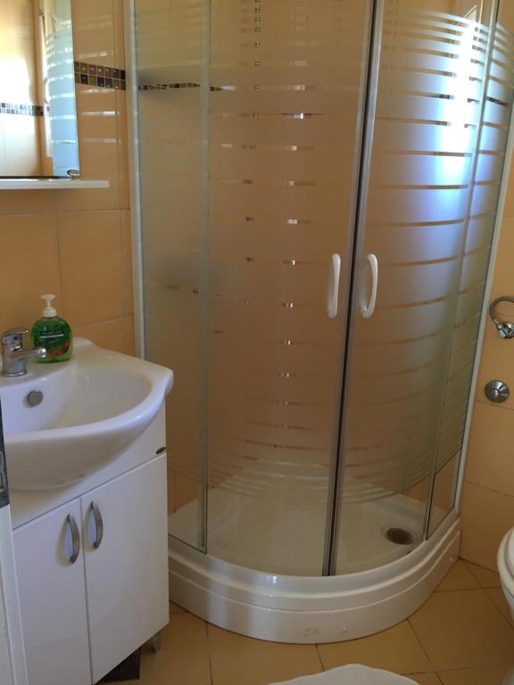 Kúpeľňa v ubytovaní Apartments Duda