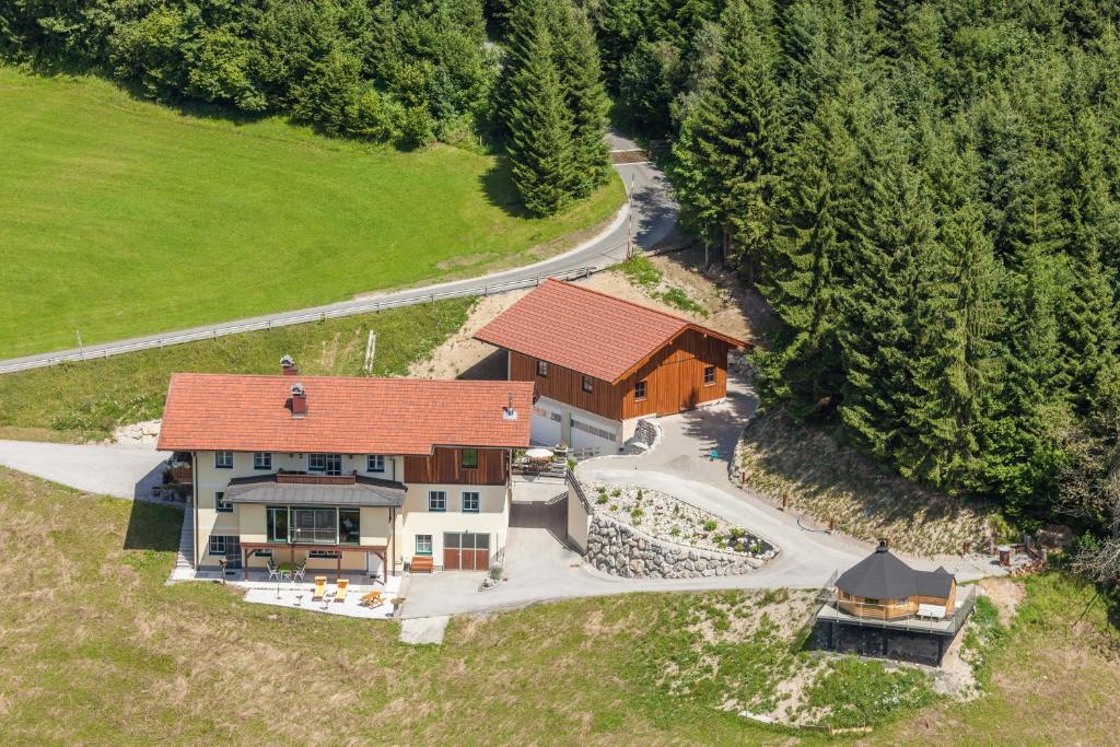an overhead view of a large house with a road at Schipplegg in Annaberg im Lammertal