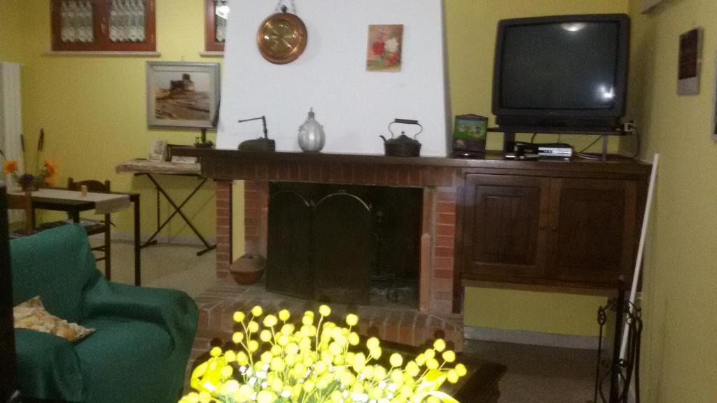 Telewizja i/lub zestaw kina domowego w obiekcie B&B La villetta rossa