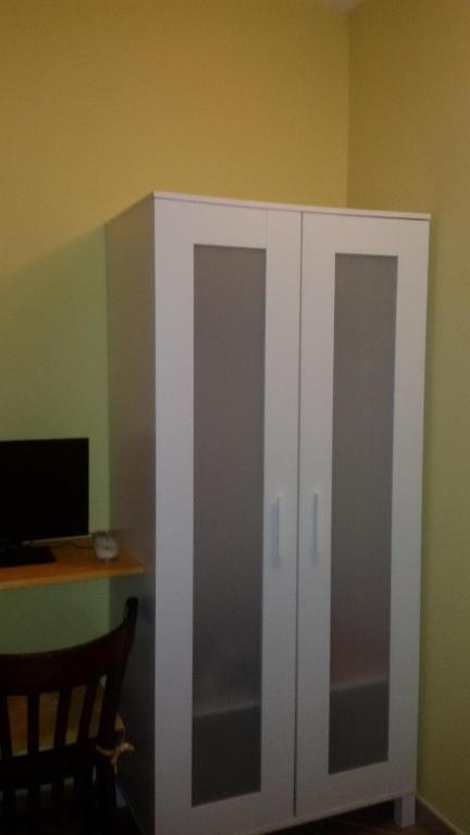 Telewizja i/lub zestaw kina domowego w obiekcie B&B La villetta rossa