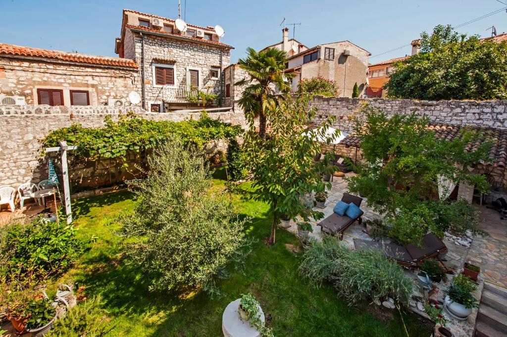 an aerial view of a garden with trees and a building at Villa Carera old town of Rovinj-Rovigno in Rovinj
