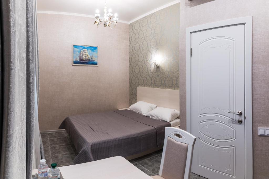 Postel nebo postele na pokoji v ubytování L.O.Y Family Hotel