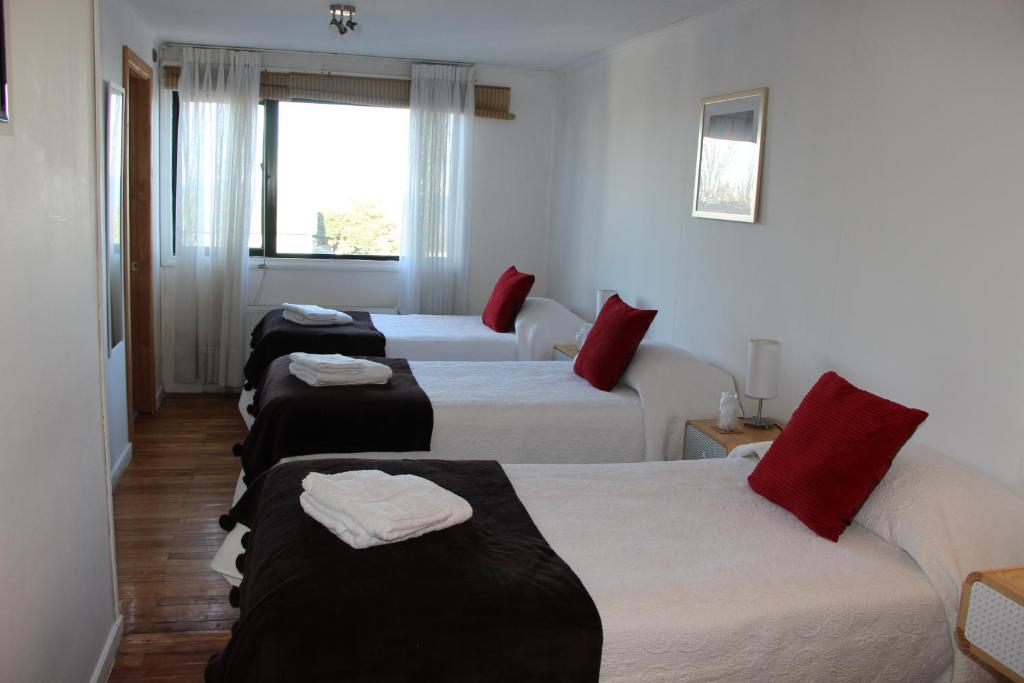 Katil atau katil-katil dalam bilik di Hostal Fernando de Magalhaes