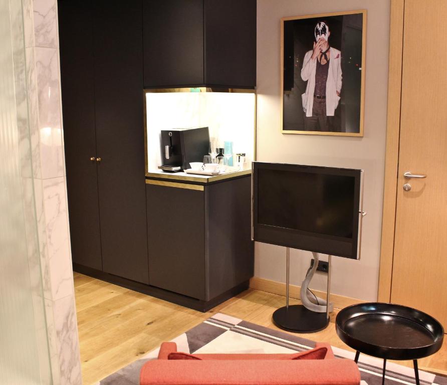 Televízia a/alebo spoločenská miestnosť v ubytovaní The Guesthouse Vienna