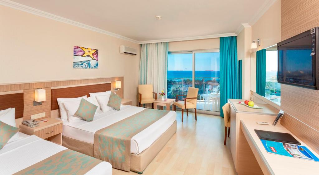 TV a/nebo společenská místnost v ubytování Narcia Resort Side - Ultra All Inclusive
