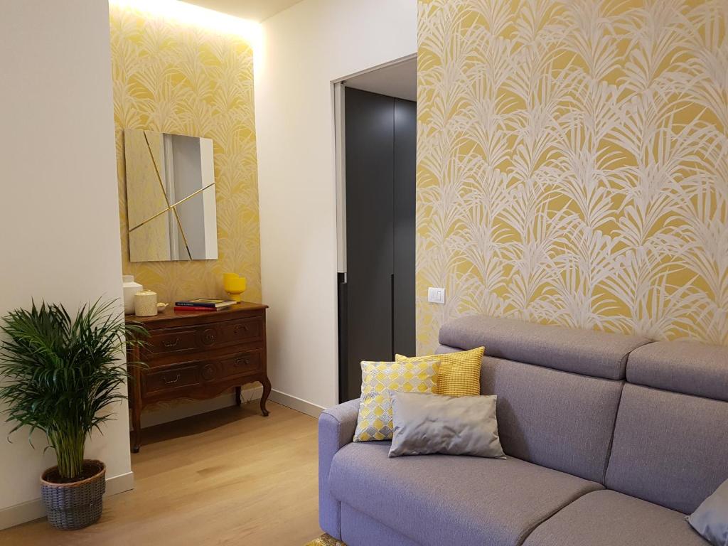 A seating area at Madeleine apartments - Brera