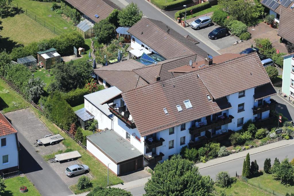 an overhead view of a house with a brown roof at Dorf gut Hotel zur Warte in Witzenhausen