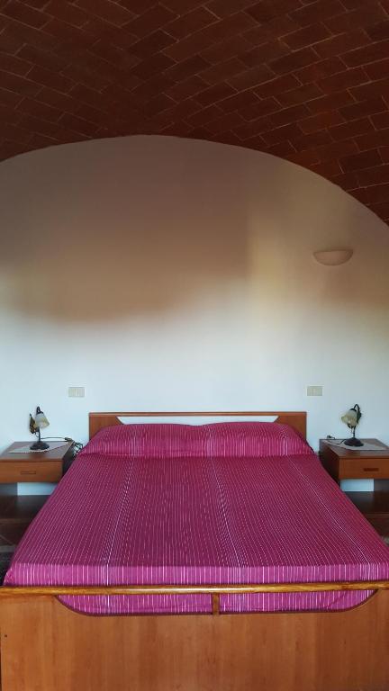 Postel nebo postele na pokoji v ubytování Orto degli Ulivi