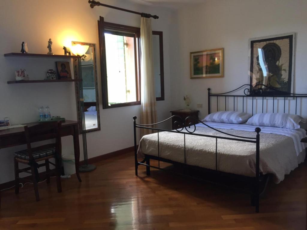 Postel nebo postele na pokoji v ubytování B&B Zia Maria