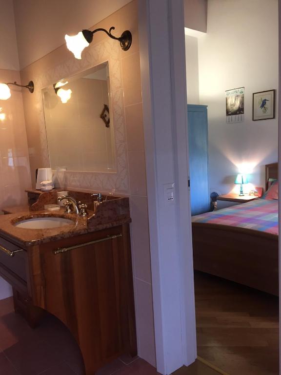 Postel nebo postele na pokoji v ubytování B&B Zia Maria