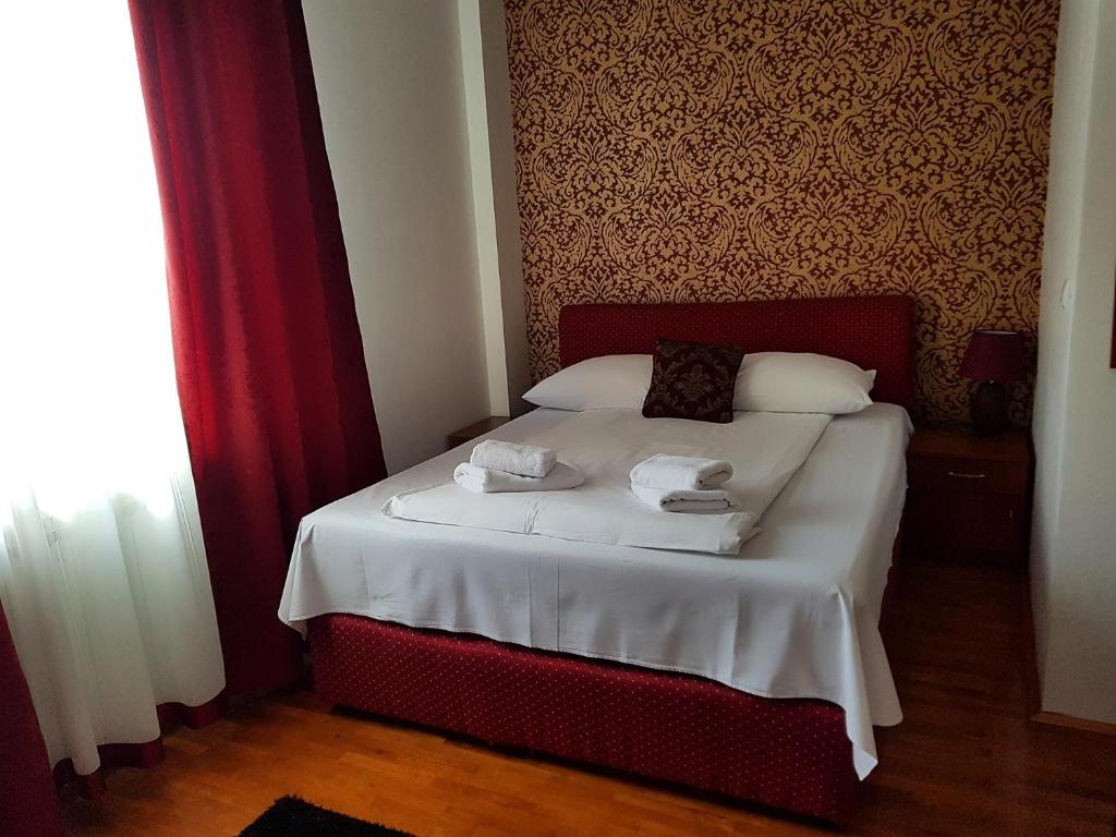 Postel nebo postele na pokoji v ubytování Hotel BOB
