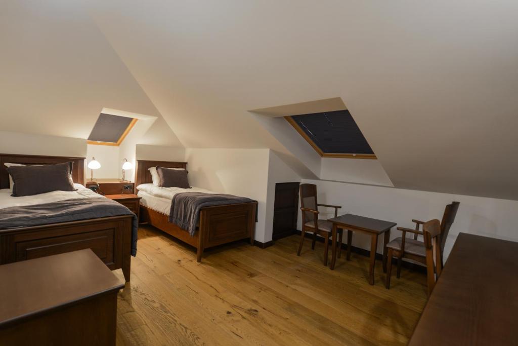Een bed of bedden in een kamer bij Hotel Barleti