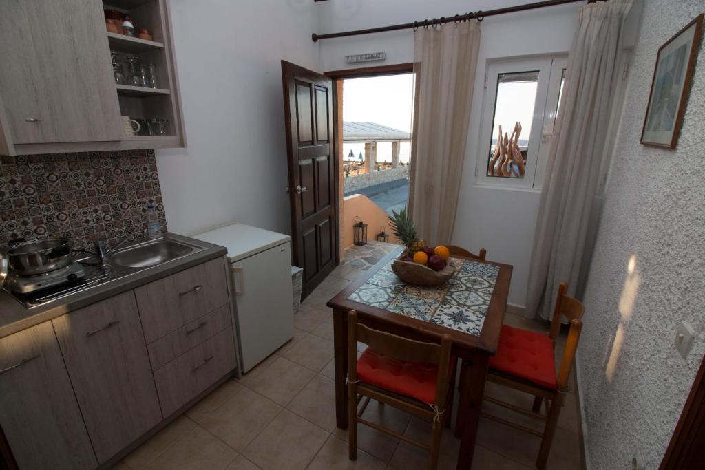 Kuchyň nebo kuchyňský kout v ubytování Ilias Apartments