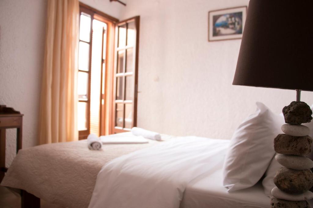 Postel nebo postele na pokoji v ubytování Ilias Apartments