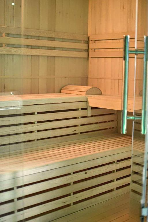 a room with three bunk beds in a room at Linfinity in Baillonville