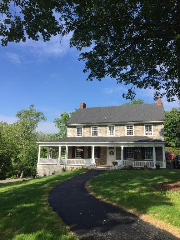 a house with a driveway leading to it at Allenberry Resort in Carlisle