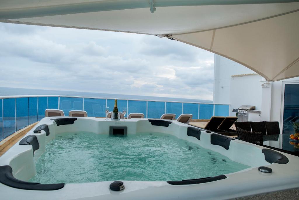 a hot tub on the deck of a cruise ship at OCEAN VIEW SPACIOUS PENTHOUSES WITH BIG TERRACES AND OVER 318 Square Meters in Cartagena de Indias