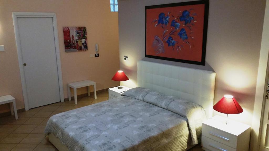 Postel nebo postele na pokoji v ubytování Tortugas B&B