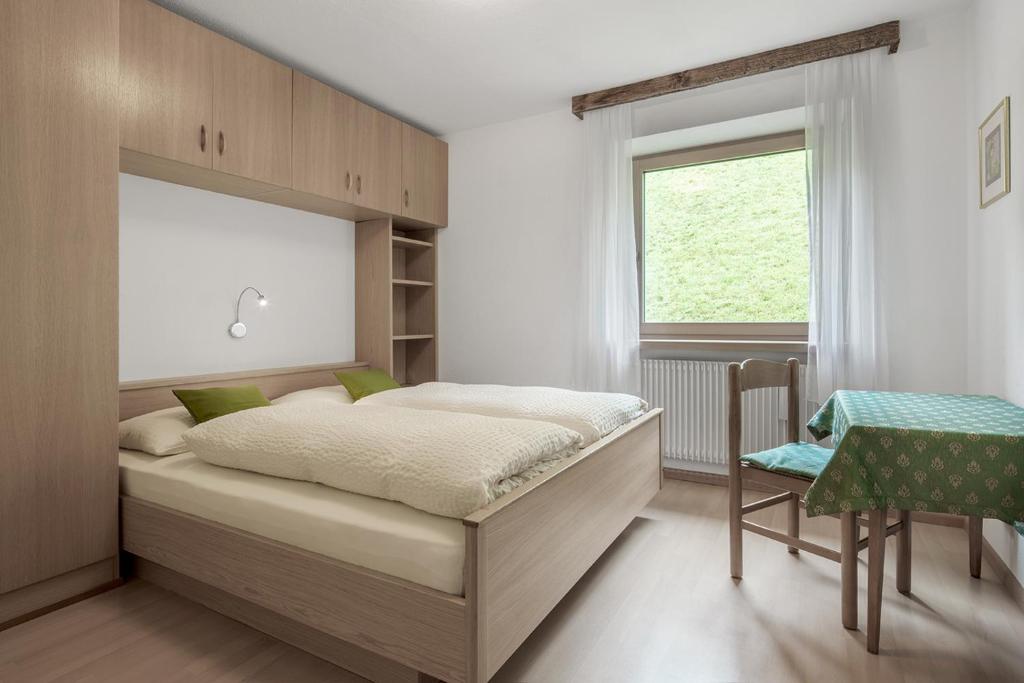 Postel nebo postele na pokoji v ubytování Ciasa de Lenz