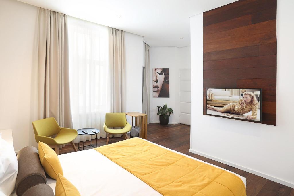 Postel nebo postele na pokoji v ubytování Dominic Smart & Luxury Suites - Terazije