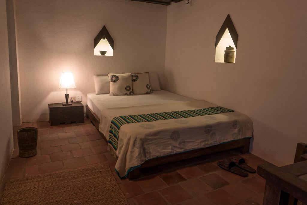 Postel nebo postele na pokoji v ubytování Peacock Guest House