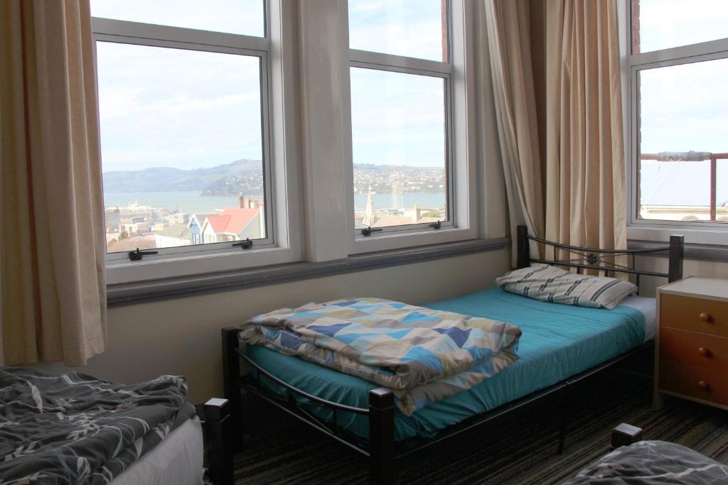 Postel nebo postele na pokoji v ubytování Chalet Backpackers
