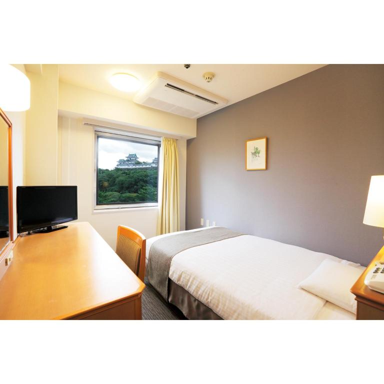 TV a/nebo společenská místnost v ubytování Smile Hotel Wakayama