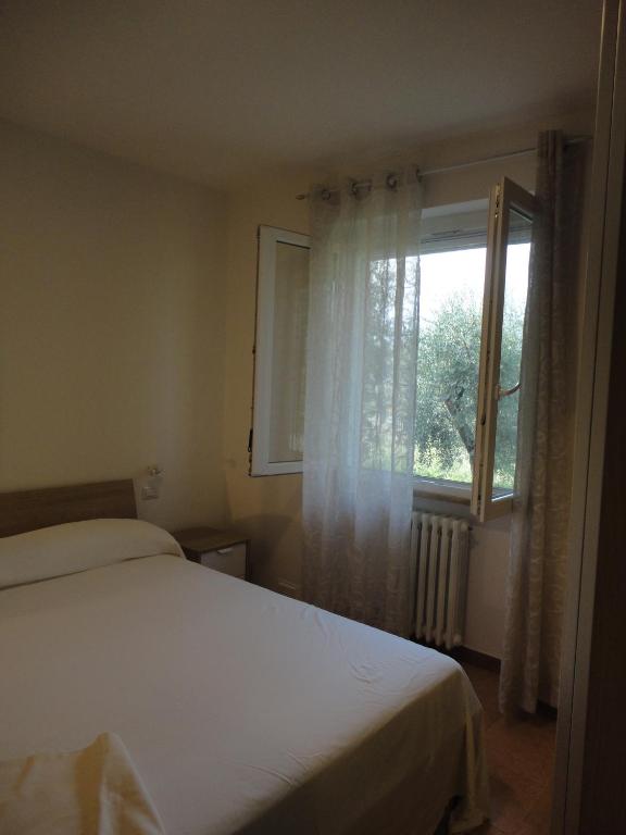 A bed or beds in a room at Bio Forester