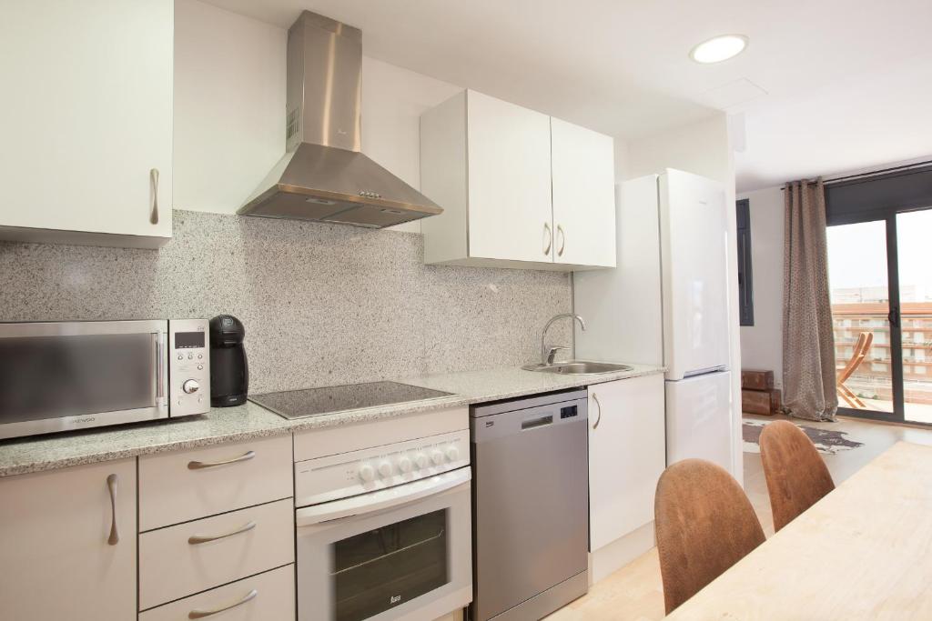 Kuchnia lub aneks kuchenny w obiekcie Apartment Beach Front Canet