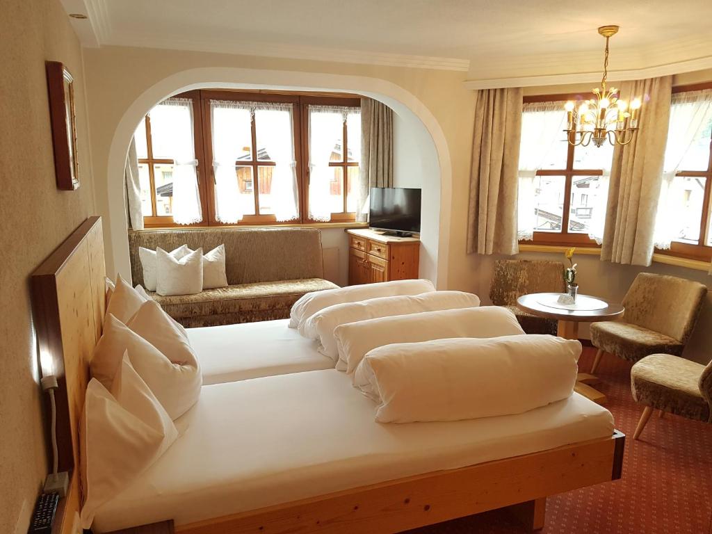 Postel nebo postele na pokoji v ubytování Hotel Ehrenreich