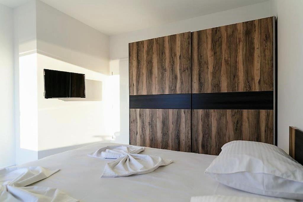 Łóżko lub łóżka w pokoju w obiekcie VIP Deluxe Villa JASMINA