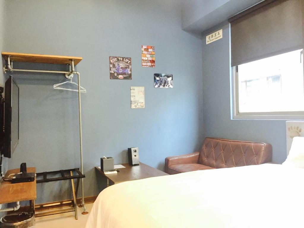 Postel nebo postele na pokoji v ubytování Bear Hotel