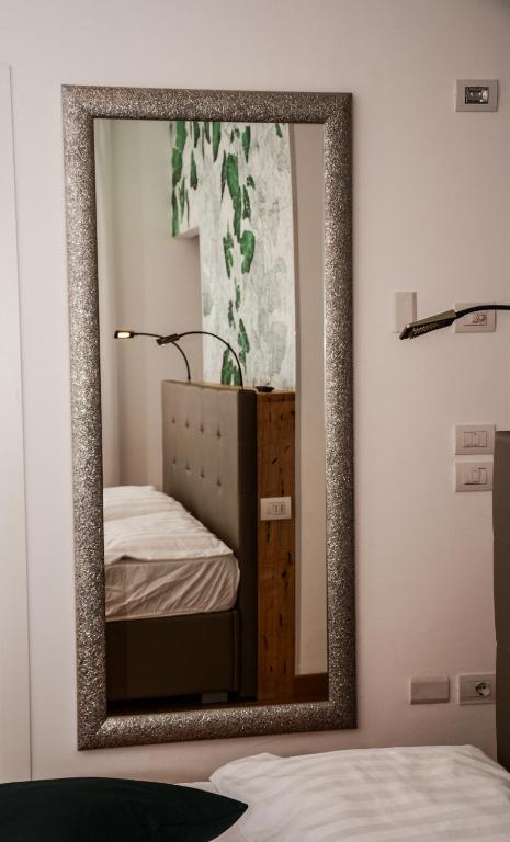 Postel nebo postele na pokoji v ubytování Villa Torbole