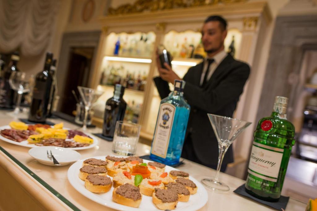 Nápoje v ubytování Hotel San Michele