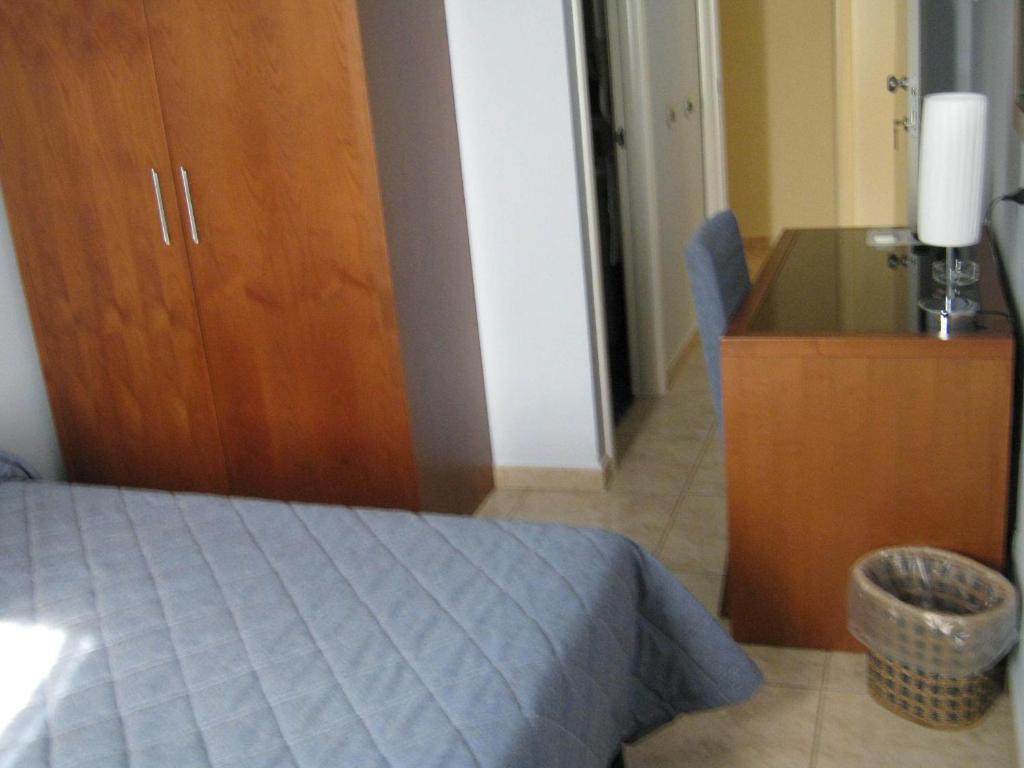 Cama ou camas em um quarto em Hotel San Martino