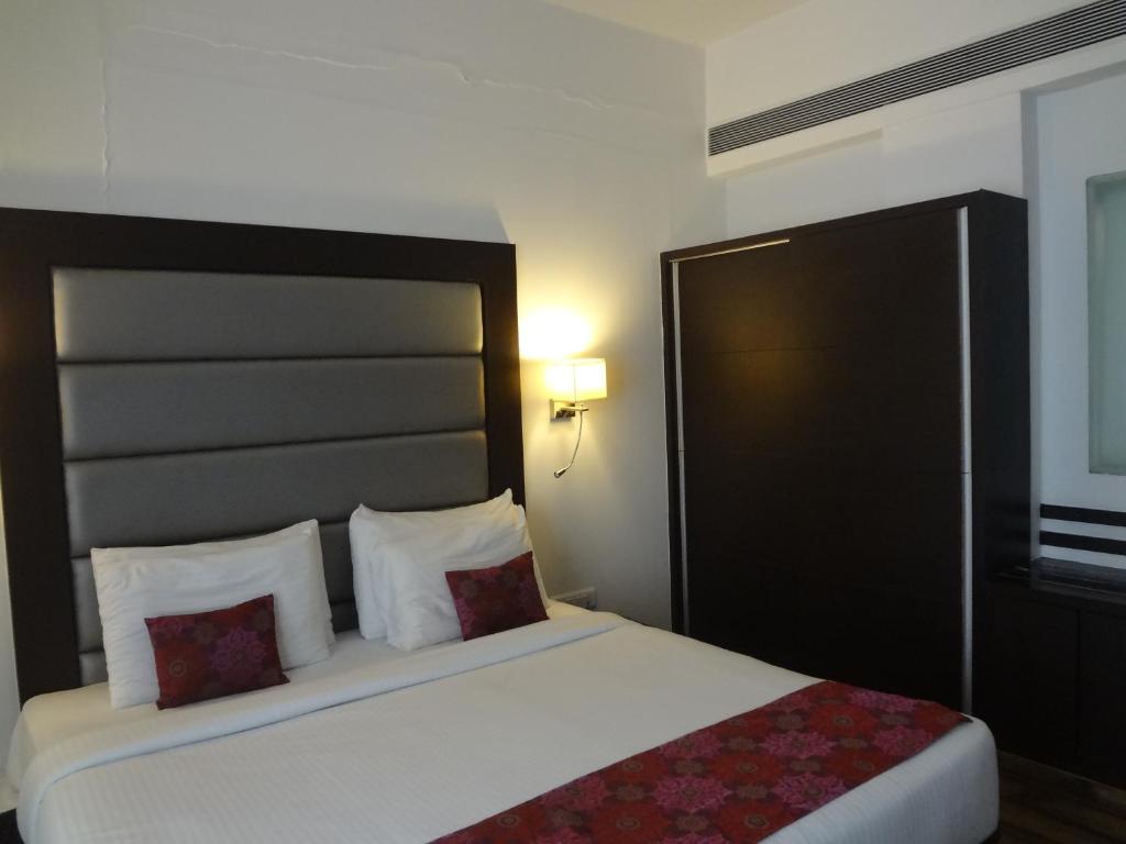 Postel nebo postele na pokoji v ubytování Veronica Hotel