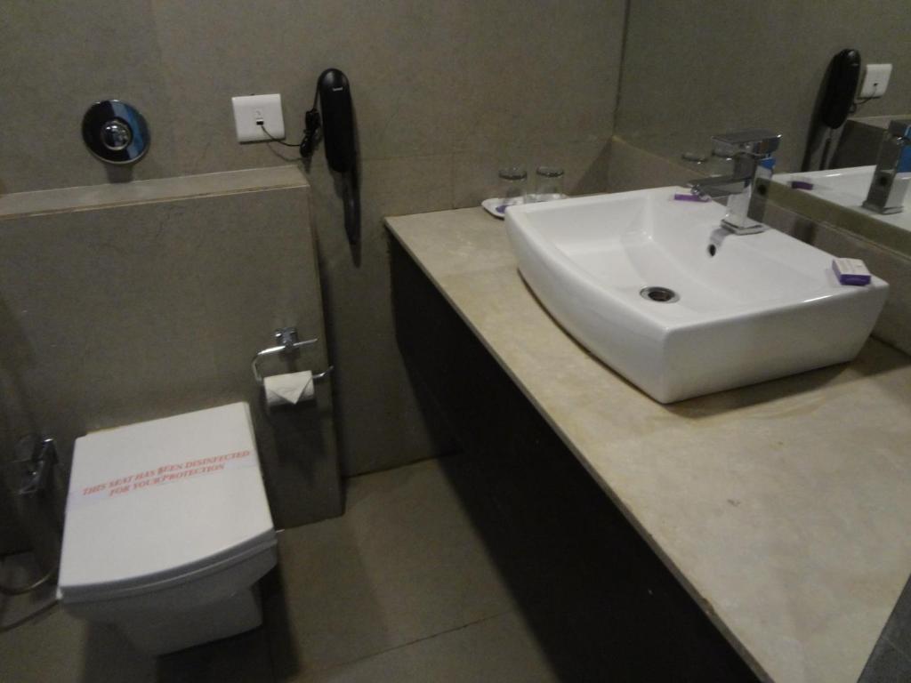 Koupelna v ubytování Veronica Hotel