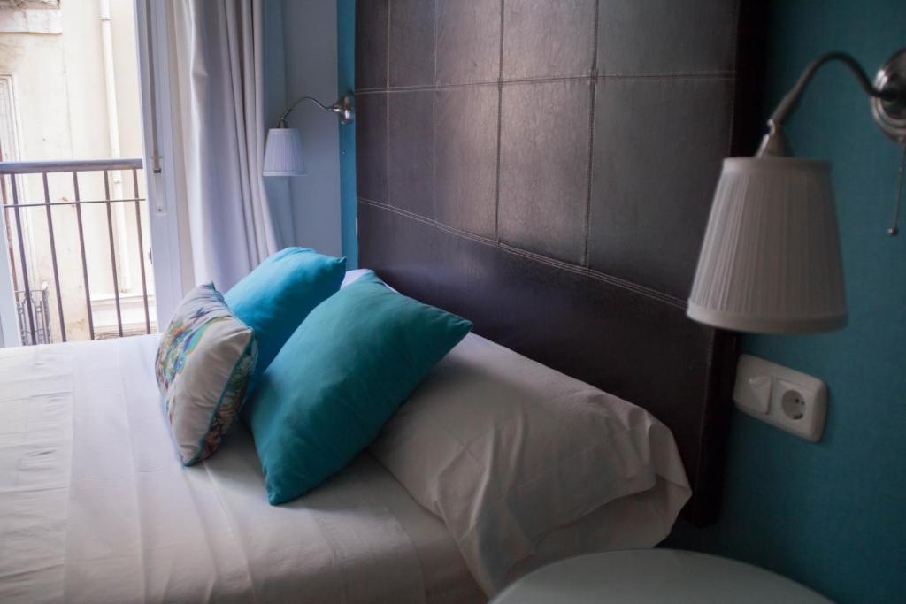 Posteľ alebo postele v izbe v ubytovaní Apartamento Ulises Suite 1