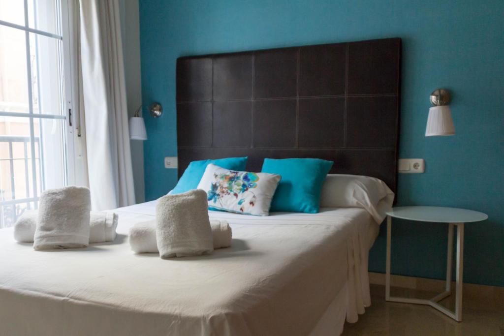 Posteľ alebo postele v izbe v ubytovaní Apartamento Ulises Suite 1