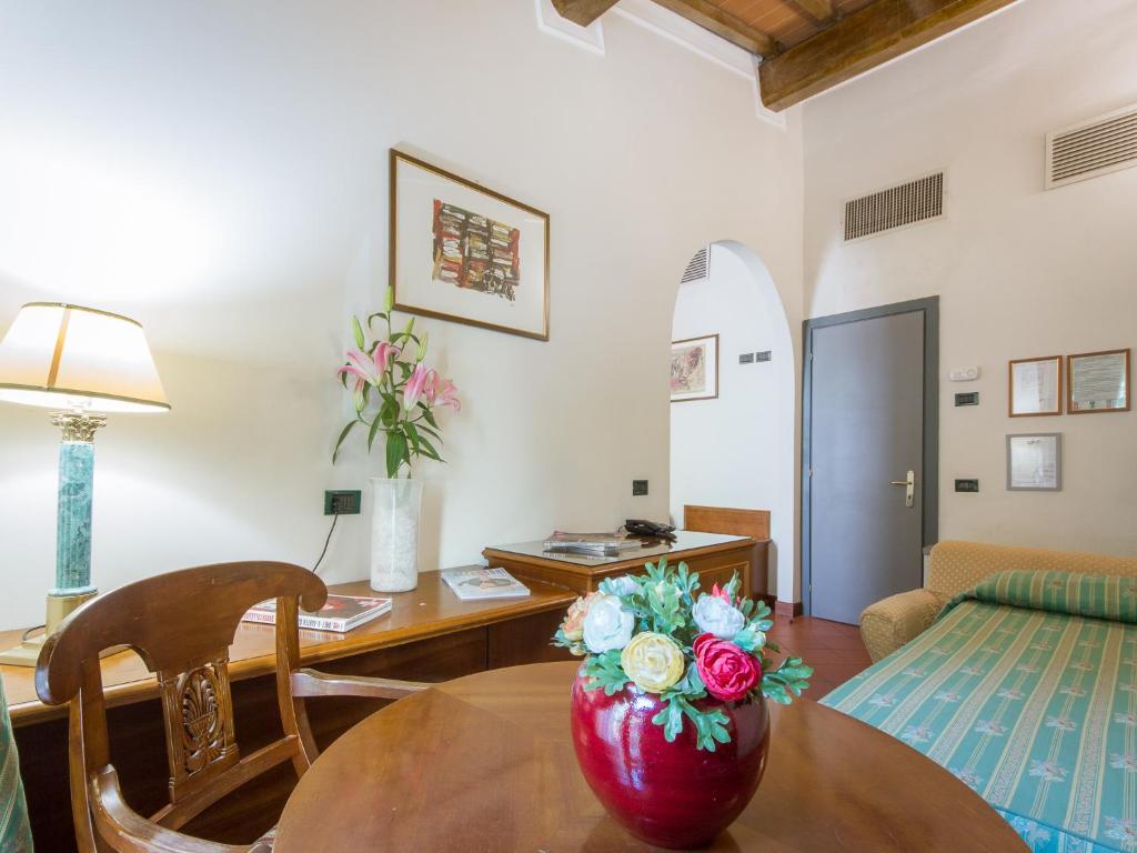 Łóżko lub łóżka w pokoju w obiekcie Hotel Panama