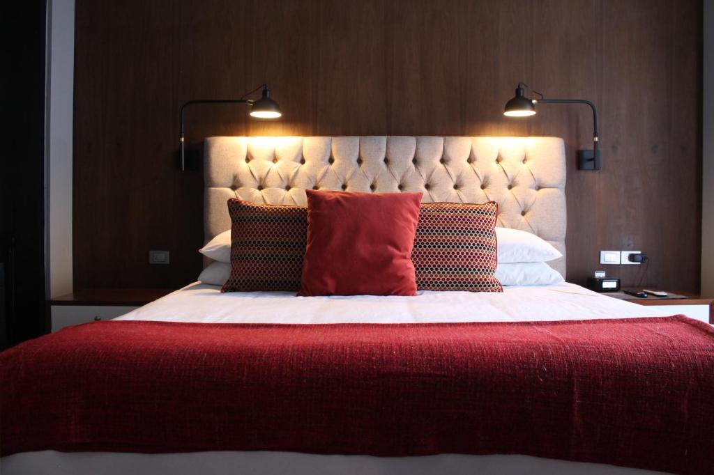 Postel nebo postele na pokoji v ubytování Hotel Love It CAS Consulado