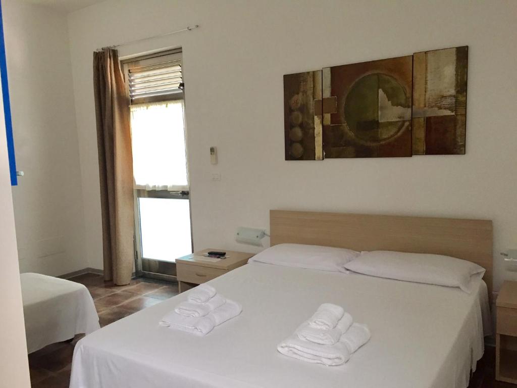 Postel nebo postele na pokoji v ubytování B&B Torrefano