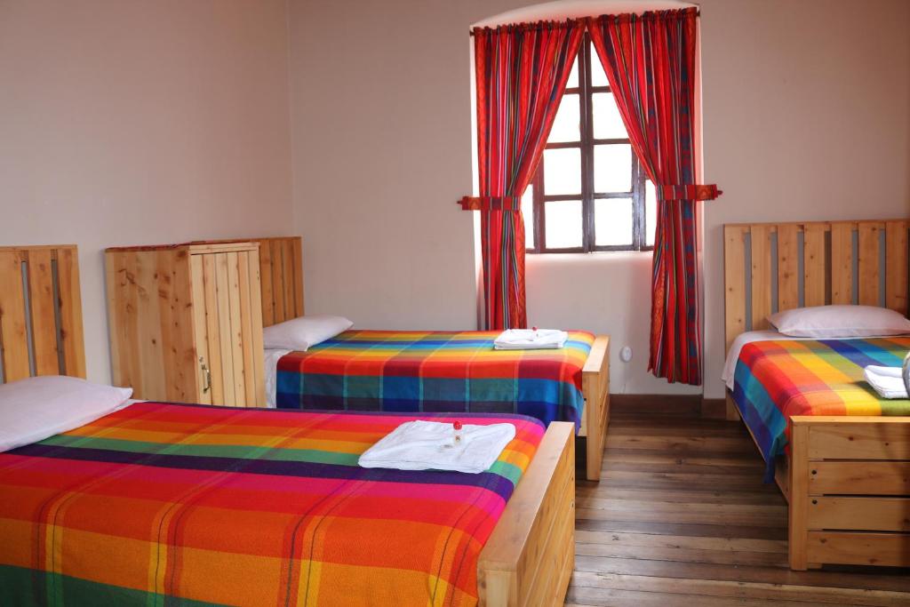 Postel nebo postele na pokoji v ubytování El Andariego