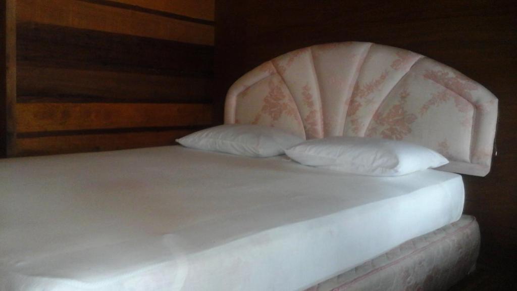 Postel nebo postele na pokoji v ubytování Beach Guest House