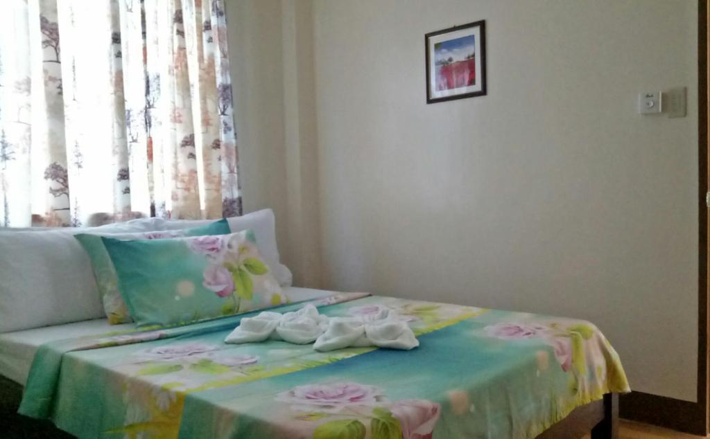 Postel nebo postele na pokoji v ubytování Jvhaven Pension
